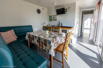 Telewizja i/lub zestaw kina domowego w obiekcie Forteca, słoneczne domki rekreacyjne