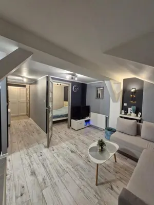Łóżko lub łóżka w pokoju w obiekcie Apartament Z Widokiem Na Wieżę