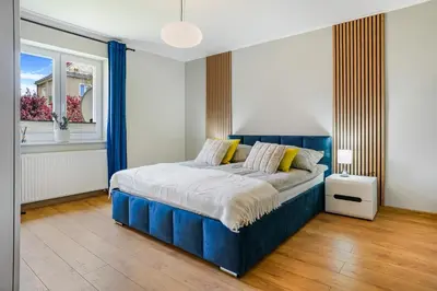 Łóżko lub łóżka w pokoju w obiekcie Apartament u Agi 2