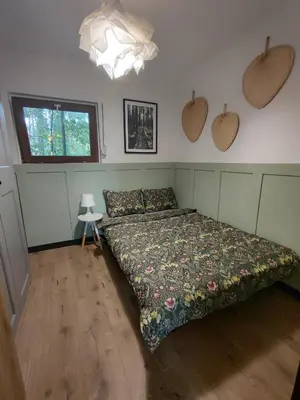 Łóżko lub łóżka w pokoju w obiekcie Apartament Turawa