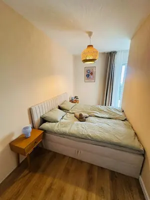 Łóżko lub łóżka w pokoju w obiekcie Green Flat