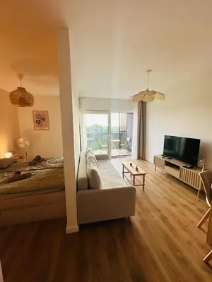 Telewizja i/lub zestaw kina domowego w obiekcie Green Flat