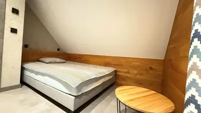 Łóżko lub łóżka w pokoju w obiekcie Bliżej Ślęży Domki pod Ślężą