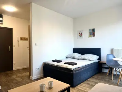 Łóżko lub łóżka w pokoju w obiekcie Przyjaźni 16 Apt 26 - Self Check-In 20h - Lift