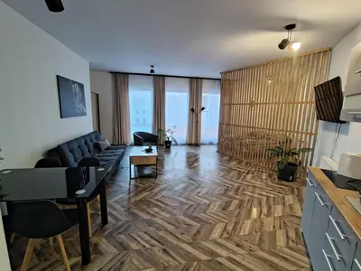 Telewizja i/lub zestaw kina domowego w obiekcie Apartament Lewi