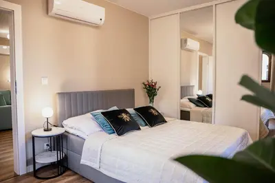 Łóżko lub łóżka w pokoju w obiekcie Hugo4You Apartments
