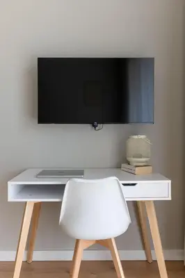 Telewizja i/lub zestaw kina domowego w obiekcie Legnicka Residence Studio Apartments with AC - ProperUNIT