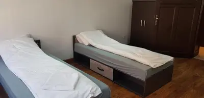 Łóżko lub łóżka w pokoju w obiekcie Apartamenty Bednarska 2a