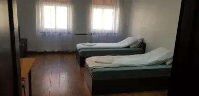 Łóżko lub łóżka w pokoju w obiekcie Apartamenty Bednarska 2a