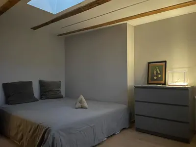 Łóżko lub łóżka w pokoju w obiekcie SKYVIEW Apartment