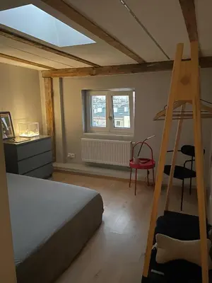 Łóżko lub łóżka w pokoju w obiekcie SKYVIEW Apartment