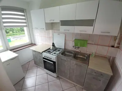 Kuchnia lub aneks kuchenny w obiekcie Lokal na Złotym