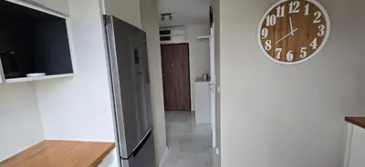 Telewizja i/lub zestaw kina domowego w obiekcie Apartament z widokiem na Sky Tower