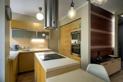 Kuchnia lub aneks kuchenny w obiekcie RentPlanet - Apartament Więzienna