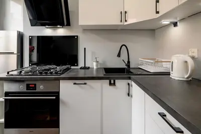 Kuchnia lub aneks kuchenny w obiekcie RentPlanet - Apartament Świdnicka
