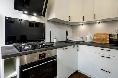 Kuchnia lub aneks kuchenny w obiekcie RentPlanet - Apartament Świdnicka