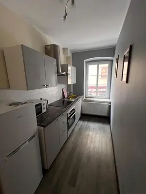Kuchnia lub aneks kuchenny w obiekcie MaWi Apartament