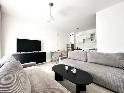 Telewizja i/lub zestaw kina domowego w obiekcie Iwaszkiewicza Apartment - Parking & Balcony