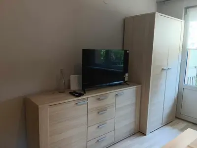 Telewizja i/lub zestaw kina domowego w obiekcie Mieszkanie Centrum