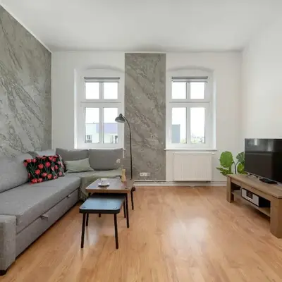 Spacious Apartment with WiFi & Smart TV Remote Working by Noclegi Renters