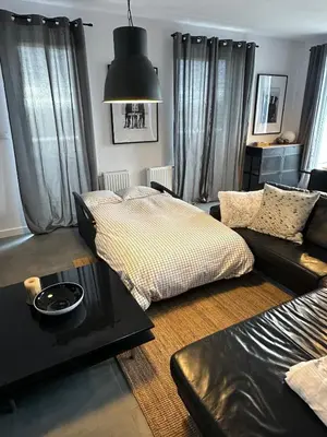 Łóżko lub łóżka w pokoju w obiekcie Apartment z tarasem