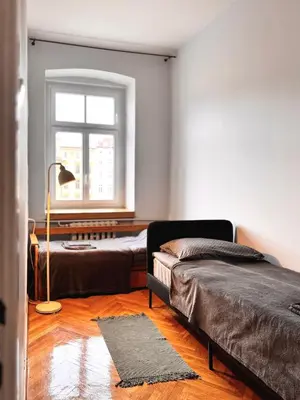 Łóżko lub łóżka w pokoju w obiekcie City Center - central apartment Kazimierza Wielkiego