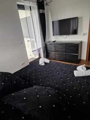 Łóżko lub łóżka w pokoju w obiekcie Apartament Marzenie
