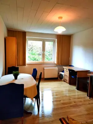 Łóżko lub łóżka w pokoju w obiekcie Mieszkanie dwupokojowe z osobną kuchnią