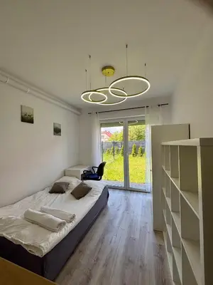 Łóżko lub łóżka w pokoju w obiekcie Studio Hop To Wrocław