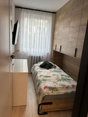 Łóżko lub łóżka w pokoju w obiekcie Zielone Stablowice Wrocław