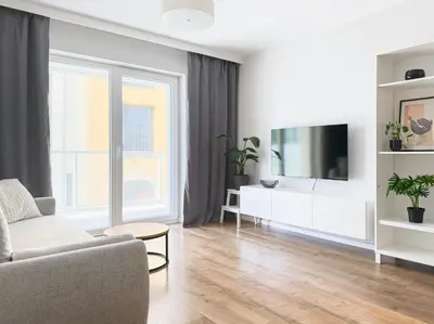 Telewizja i/lub zestaw kina domowego w obiekcie Księcia Witolda apart river and lift
