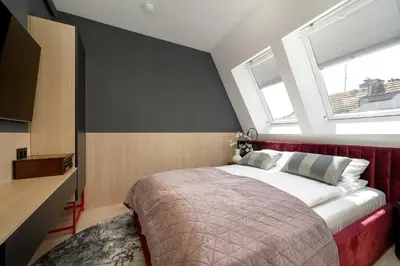 Łóżko lub łóżka w pokoju w obiekcie Climatic Apartment in the Centre of Wrocław Near the Market Square by Noclegi Renters