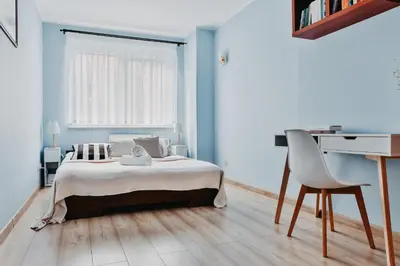 Łóżko lub łóżka w pokoju w obiekcie Kromera - cisza i wygoda - komfort w rozsądnej cenie - Wrocław - Fair Rentals