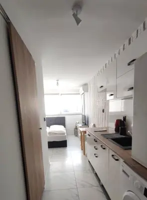 Kuchnia lub aneks kuchenny w obiekcie Aparttrans Wroclaw Old Town Studio