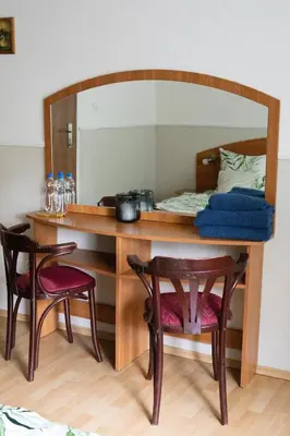 Łóżko lub łóżka w pokoju w obiekcie Pokoje Pod Zamkiem