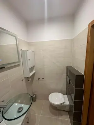 Łazienka w obiekcie Apartament blisko Krzywej Wieży Dostęp za pomocą kodu