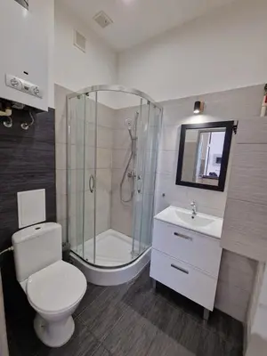 Łazienka w obiekcie Przytulny apartament z widokiem na Rynek