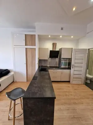 Kuchnia lub aneks kuchenny w obiekcie Przytulny apartament z widokiem na Rynek