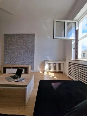 Część wypoczynkowa w obiekcie Przytulny apartament z widokiem na Rynek