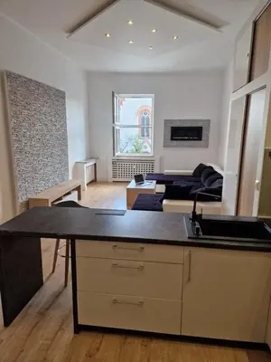 Część wypoczynkowa w obiekcie Przytulny apartament z widokiem na Rynek