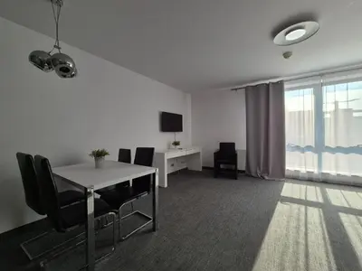 Telewizja i/lub zestaw kina domowego w obiekcie Krawiecka Trzy Zero Dwa