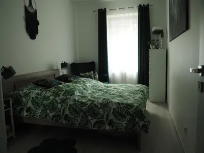 Łóżko lub łóżka w pokoju w obiekcie ZIELONO Mi 2
