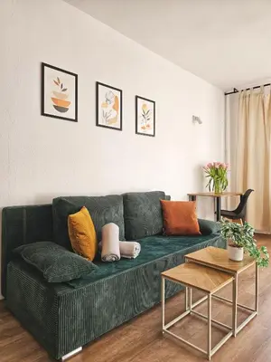Część wypoczynkowa w obiekcie Sunny apartment 3 minutes walk from Rynek square
