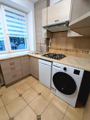 Kuchnia lub aneks kuchenny w obiekcie Sunny apartment 3 minutes walk from Rynek square
