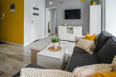 Telewizja i/lub zestaw kina domowego w obiekcie Słoneczny Apartament