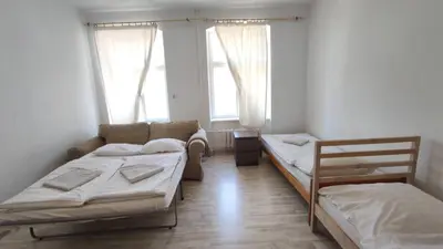 Łóżko lub łóżka w pokoju w obiekcie Botanic Garden Private Room