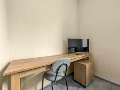 Telewizja i/lub zestaw kina domowego w obiekcie Wrocław Rynek Heartbeat Apartment by BookingHost