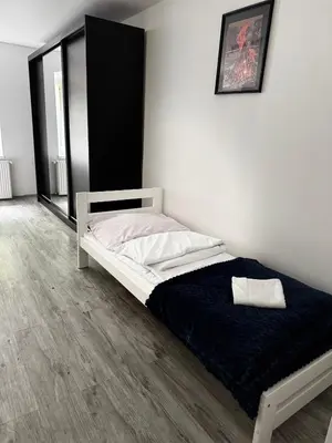 Łóżko lub łóżka w pokoju w obiekcie Apartament u Gąbki
