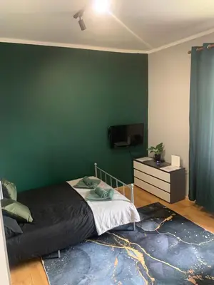 Łóżko lub łóżka w pokoju w obiekcie Przytulne Studio Góry Sowie