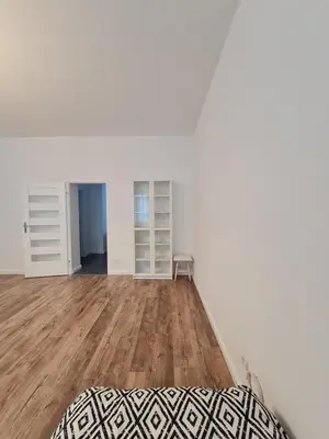 Łóżko lub łóżka w pokoju w obiekcie Merlin